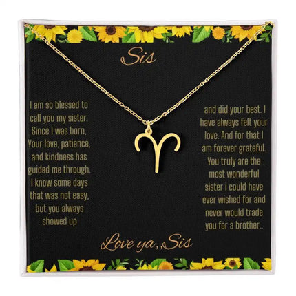 Zodiac Symbol necklace with a yellow gold Aries charm with a to Sis from Sis greeting card in a two-tone box 