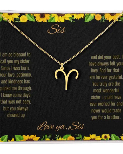 Zodiac Symbol necklace with a yellow gold Aries charm with a to Sis from Sis greeting card in a two-tone box 