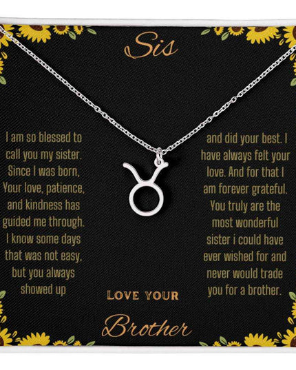 Zodiac Symbol Necklace with a polished stainless-steel Taurus charm on a to sis from brother greeting card inside a two-tone box