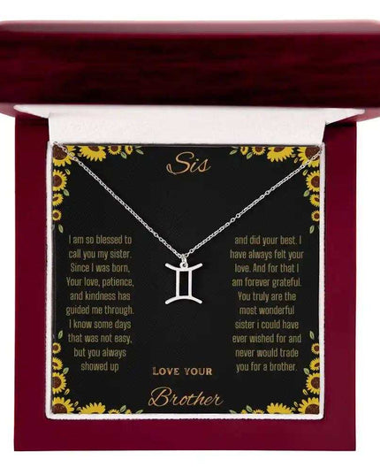 Zodiac Symbol Necklace with a polished stainless-steel Gemini charm on a to sis from brother greeting card inside a mahogany box