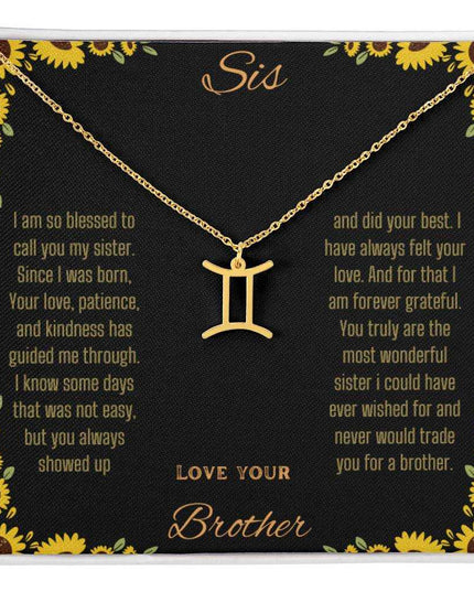 Zodiac Symbol Necklace with a yellow gold finish Gemini charm on a to sis from brother greeting card inside a two-tone box box