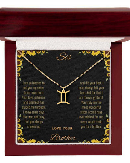 Zodiac Symbol Necklace with a yellow gold finish Gemini charm on a to sis from brother greeting card inside a mahogany box