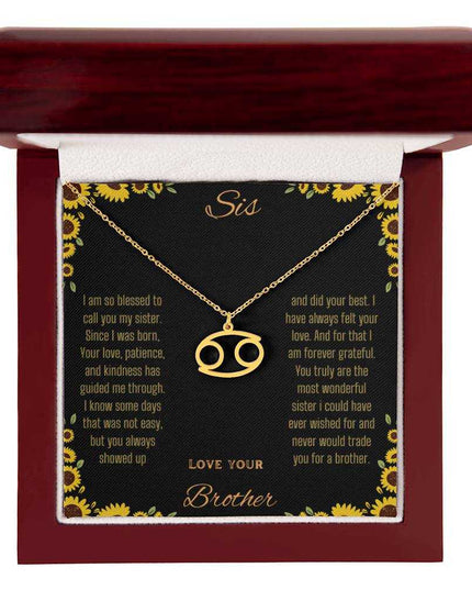 Zodiac Symbol Necklace with a yellow gold finish Cancer charm on a to sis from brother greeting card inside a mahogany box