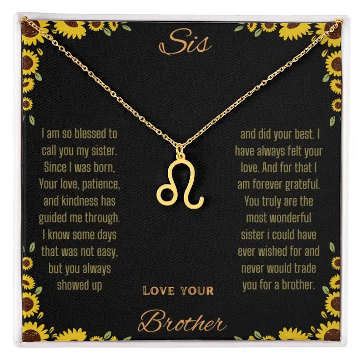 Zodiac Symbol Necklace with a yellow gold finish Leo charm on a to sis from brother greeting card inside a two-tone box box