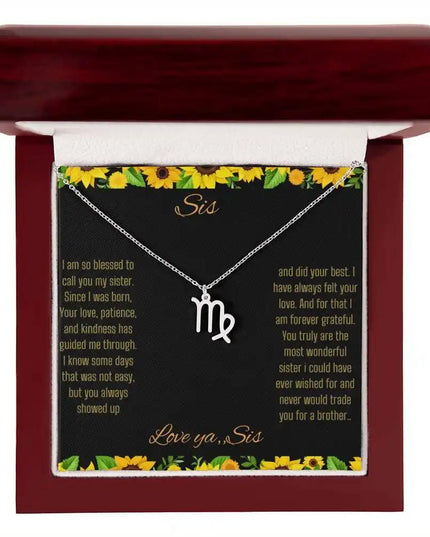 Zodiac Symbol Necklace with a polished stainless-steel Virgo charm on a to sis from sis greeting card inside a mahogany box