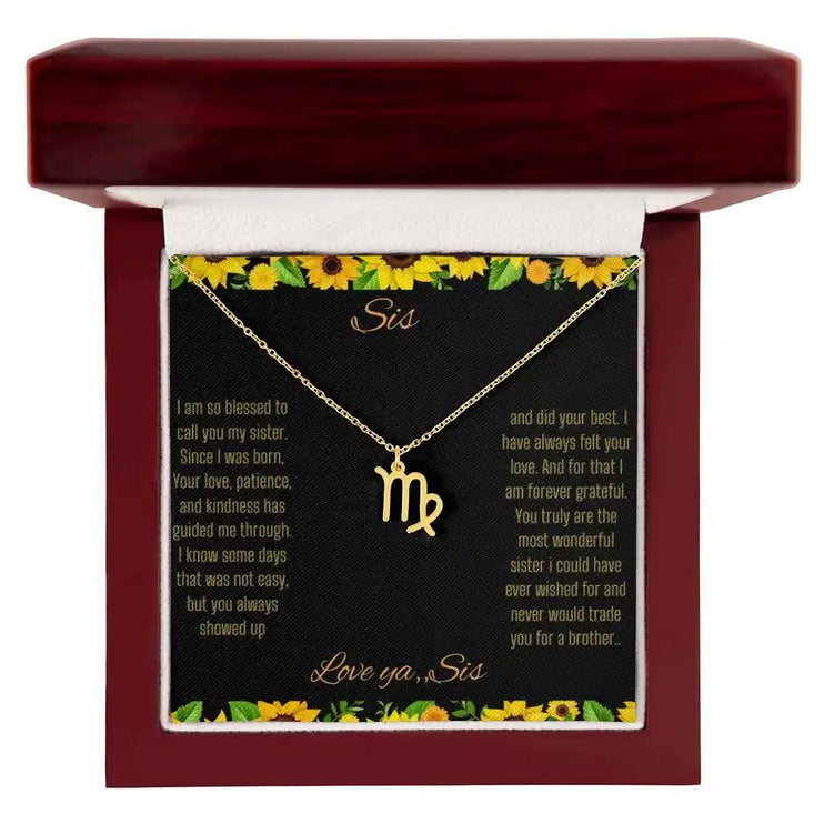 Zodiac Symbol Necklace with a yellow gold Virgo charm on a to sis from sis greeting card inside a mahogany box