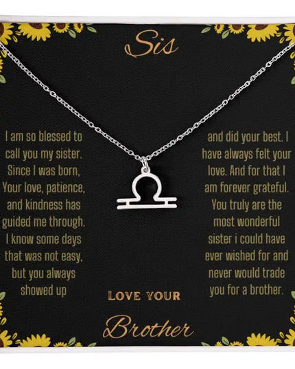 Zodiac Symbol Necklace with a polished stainless-steel Libra charm on a to sis from brother greeting card inside a two-tone box