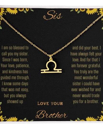 Zodiac Symbol Necklace with a yellow gold finish Libra charm on a to sis from brother greeting card inside a two-tone box box