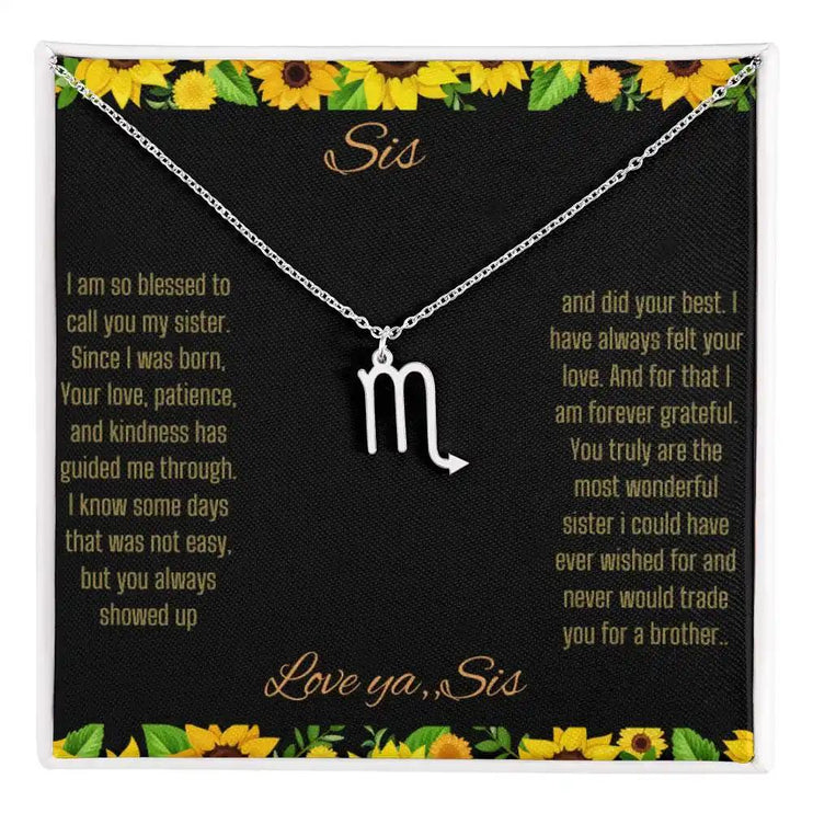 Zodiac Symbol Necklace with a polished stainless-steel Scorpio charm on a to sis from sis greeting card inside a two-tone box