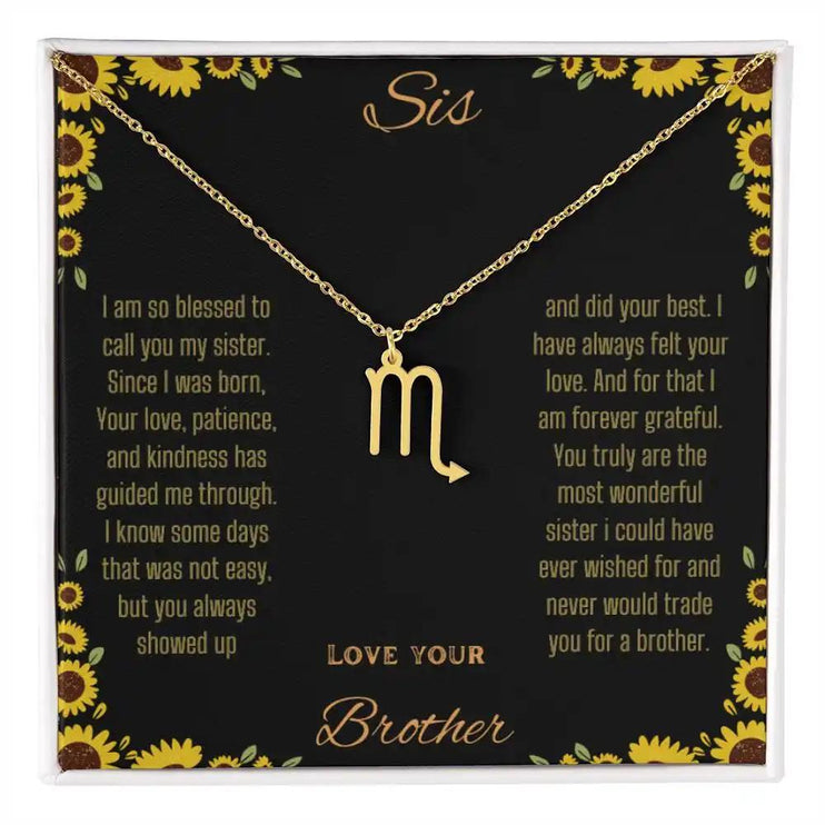 Zodiac Symbol Necklace with a yellow gold finish Scorpio charm on a to sis from brother greeting card inside a two-tone box box