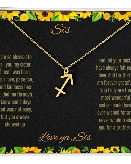 Zodiac Symbol Necklace with a yellow gold finish Sagittarius charm on a to sis from sis greeting card inside a two-tone box