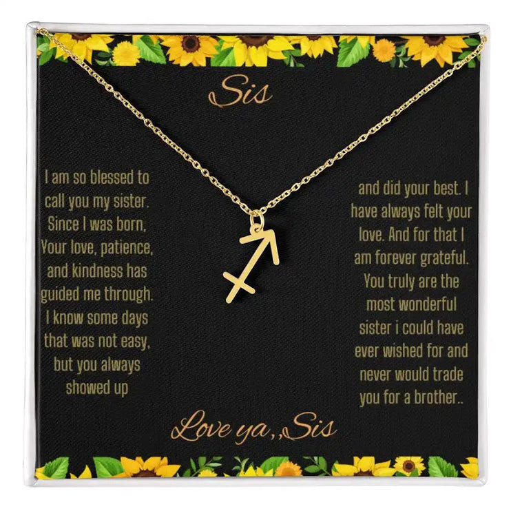 Zodiac Symbol Necklace with a yellow gold finish Sagittarius charm on a to sis from sis greeting card inside a two-tone box