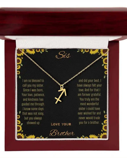 Zodiac Symbol Necklace with a yellow gold finish Sagittarius charm on a to sis from brother greeting card inside a mahogany box