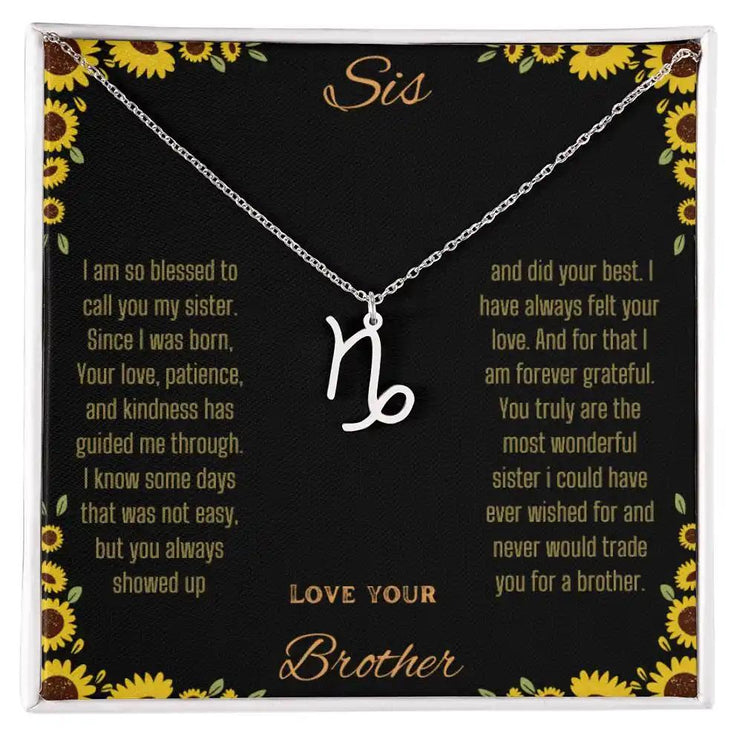 Zodiac Symbol Necklace with a polished stainless-steel Capricorn charm on a to sis from brother greeting card inside a two-tone box