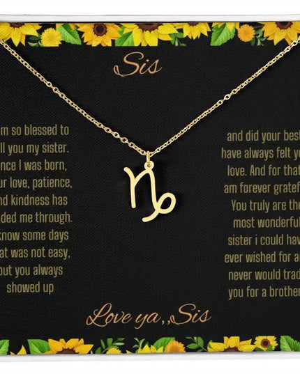 Zodiac Symbol Necklace with a yellow gold finish Capricorn charm on a to sis from sis greeting card inside a two-tone box