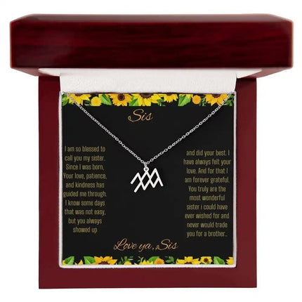 Zodiac Symbol Necklace with a polished stainless-steel Aquarius charm on a to sis from sis greeting card in a mahogany box