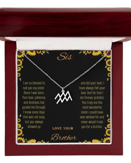 Zodiac Symbol Necklace with a polished stainless-steel Aquarius charm on a to sis from brother greeting card inside a mahogany box