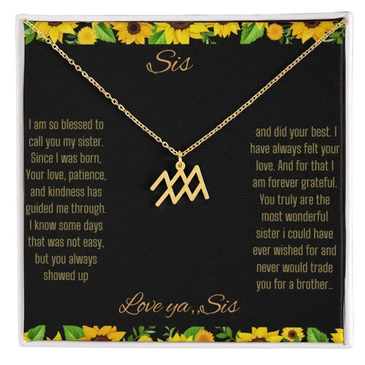 Zodiac Symbol Necklace with a yellow gold finish Aquarius charm on a to sis from sis greeting card inside a two-tone box