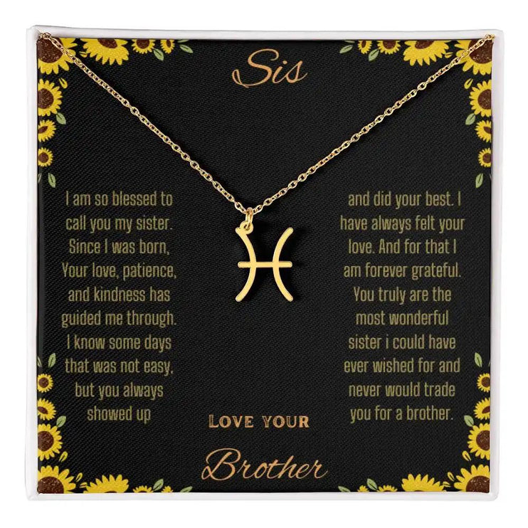 Zodiac Symbol Necklace with a yellow gold finish Pisces charm on a to sis from brother greeting card inside a two-tone box box