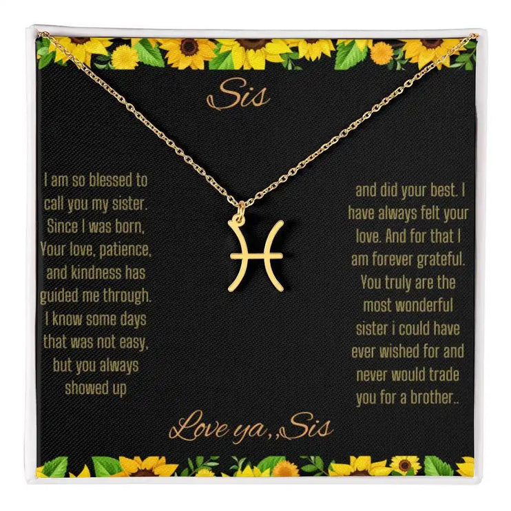 Symbol Necklace with a yellow gold finish Pisces charm on a to sis from sis greeting card inside a two-tone box