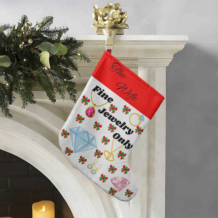 giant holiday stocking hanging from fireplace