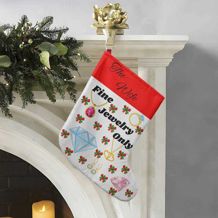 giant holiday stocking hanging from fireplace