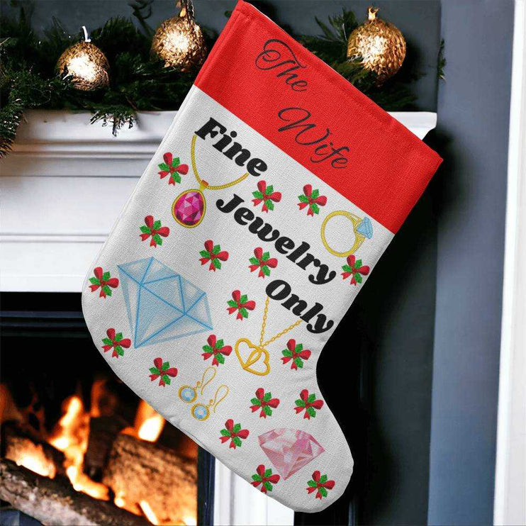 giant holiday stocking hanging from fireplace up close