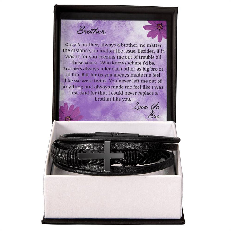 A men's cross leather bracelet in a two-tone box with to brother card