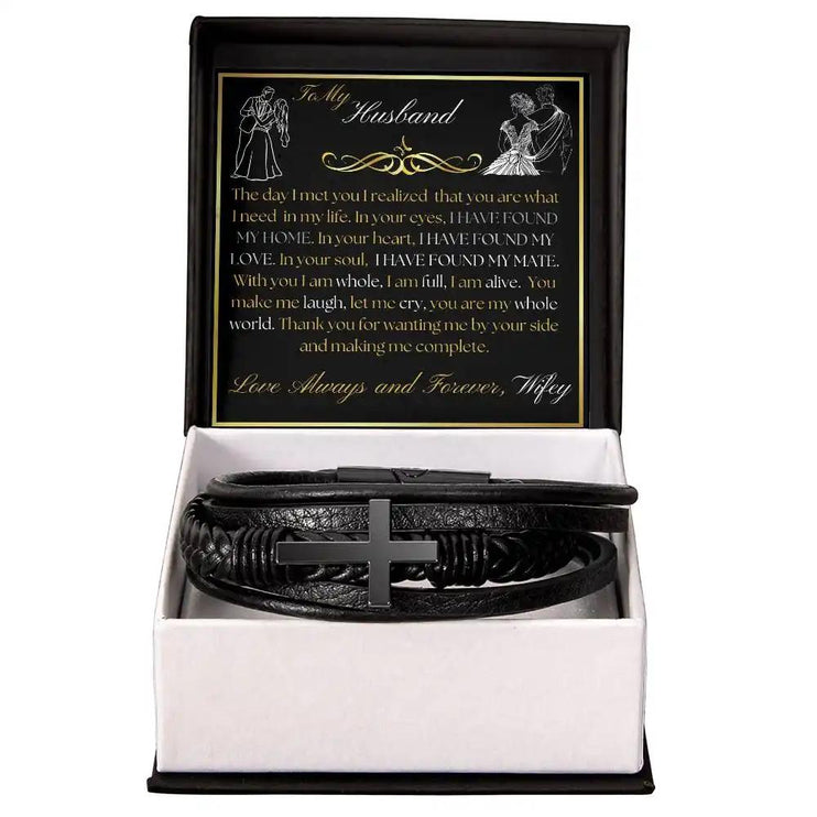 cross leather bracelet in two-tone box.