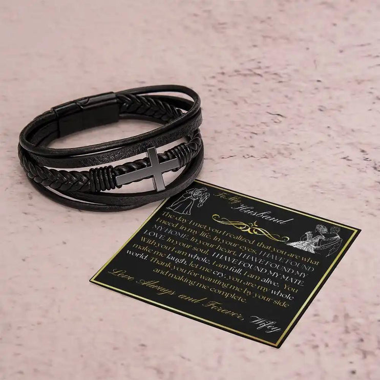 cross leather bracelet on ground no box.