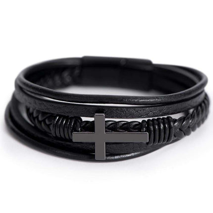 cross leather bracelet on a white backdrop