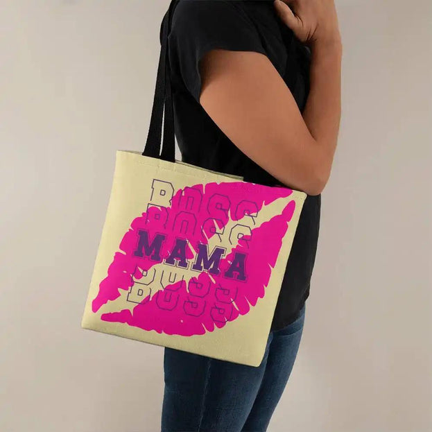 a classic tote bag on a model's shoulder facing right.
