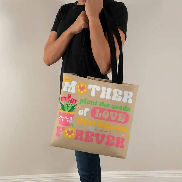 a classic tote bag with rope straps on model's shoulder faced left.