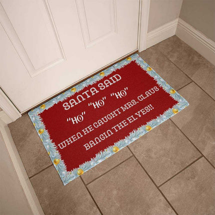 welcome mat by a white front door angled to the side