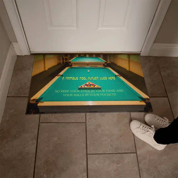 a welcome mat by a white door
