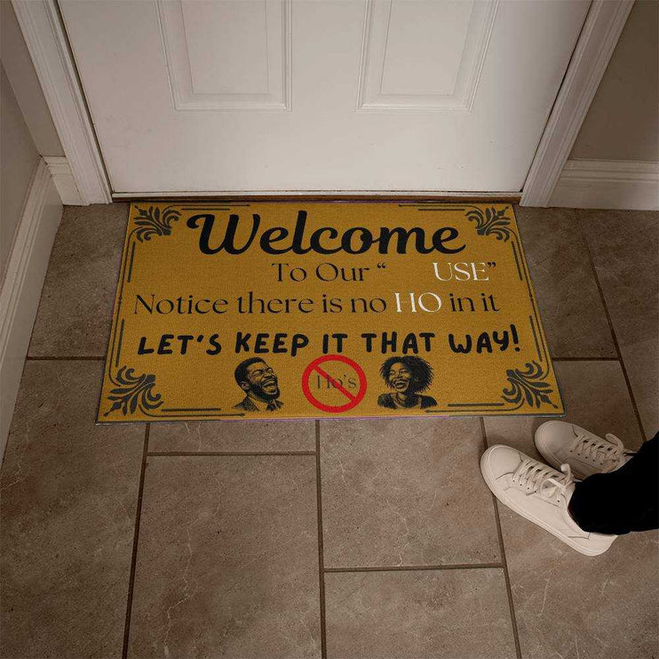 welcome mat in front of white door