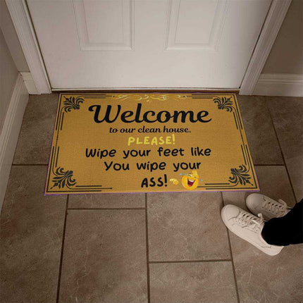 welcome mat by white door