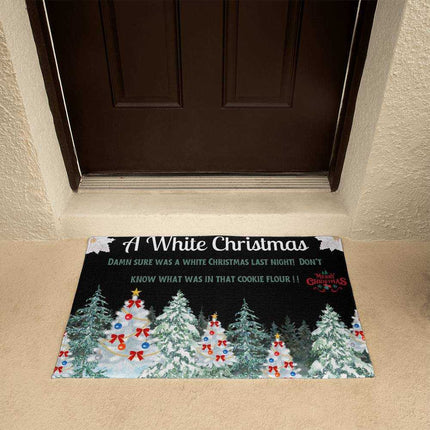 welcome mat in front of brown door outside