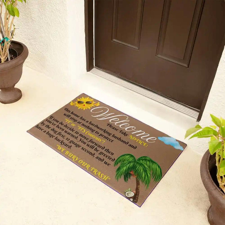 welcome mat by brown front door with plants