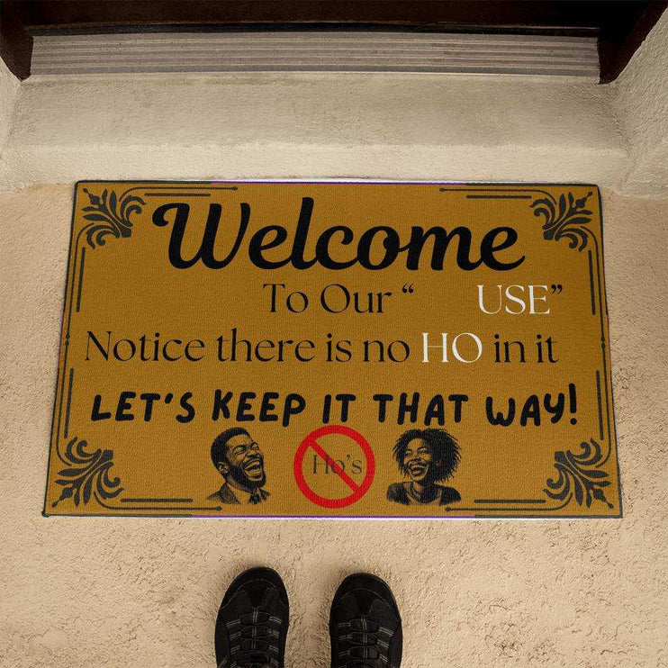 welcome mat in front of brown door with model standing beside it