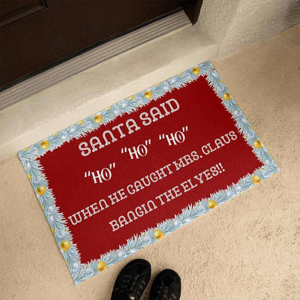 welcome mat by a brown front door
