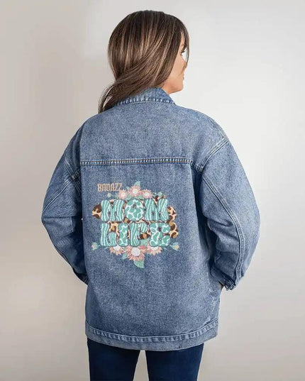 a DTG Denim Jacket with mom's life showing back of jacket on a model