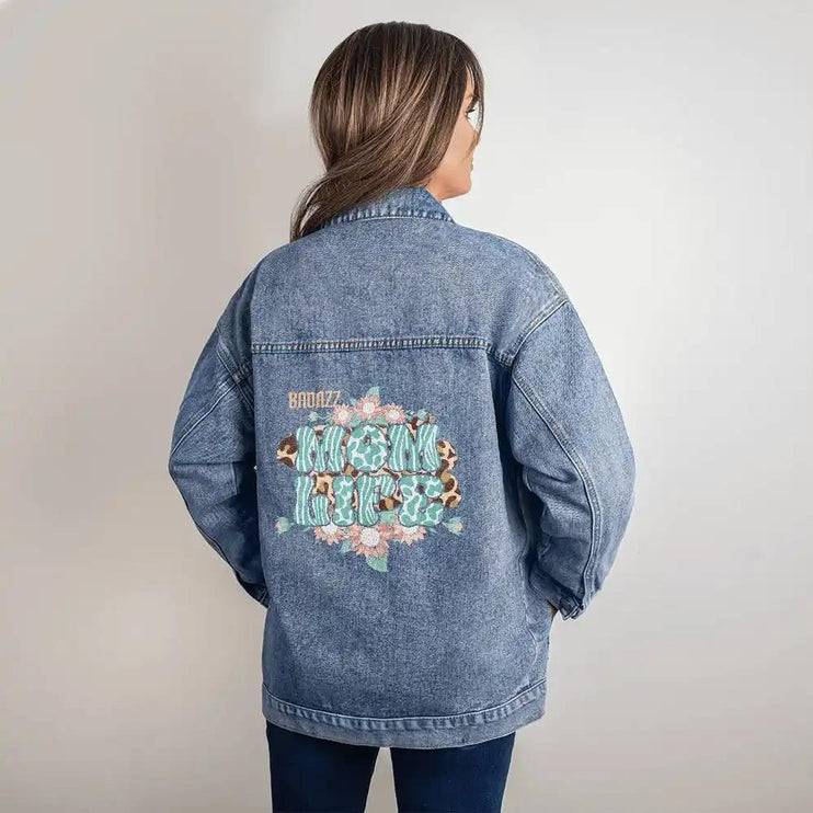 a DTG Denim Jacket with mom's life showing back of jacket on a model