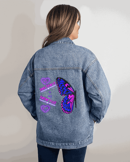 small DTG denim jacket on a model showing back
