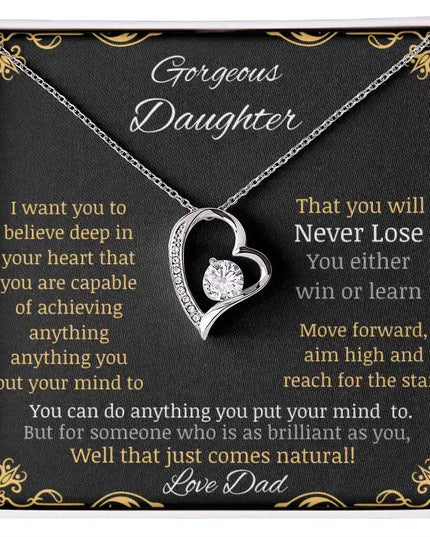 Forever Love Necklace with a white gold pendant in a two-tone box with a to daughter from dad greeting card angle close up