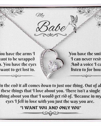 white gold forever love necklace in a soft box up close