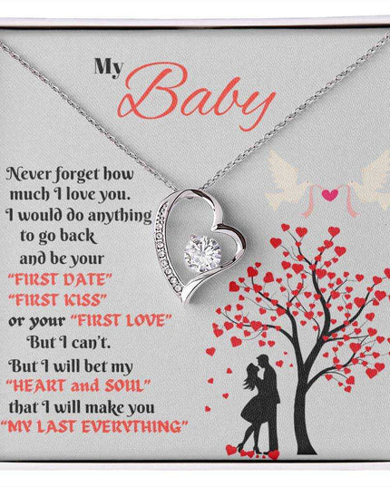 white gold forever love necklace in a soft box up close