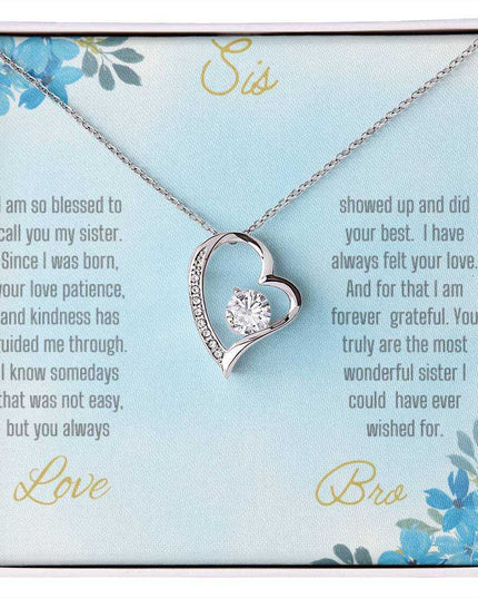 Forever Love Necklace with a white gold variant on a to sis from bro greeting card close up view.