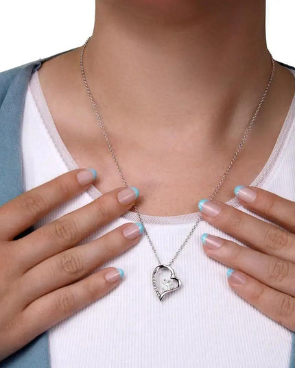 white gold forever love necklace in a mahogany box