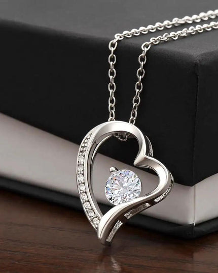 white gold forever love necklace on a two-tone box